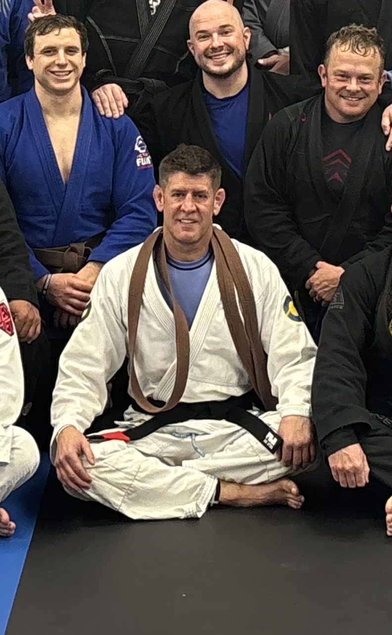 Ryan Radjewski, owner, black belt promotion